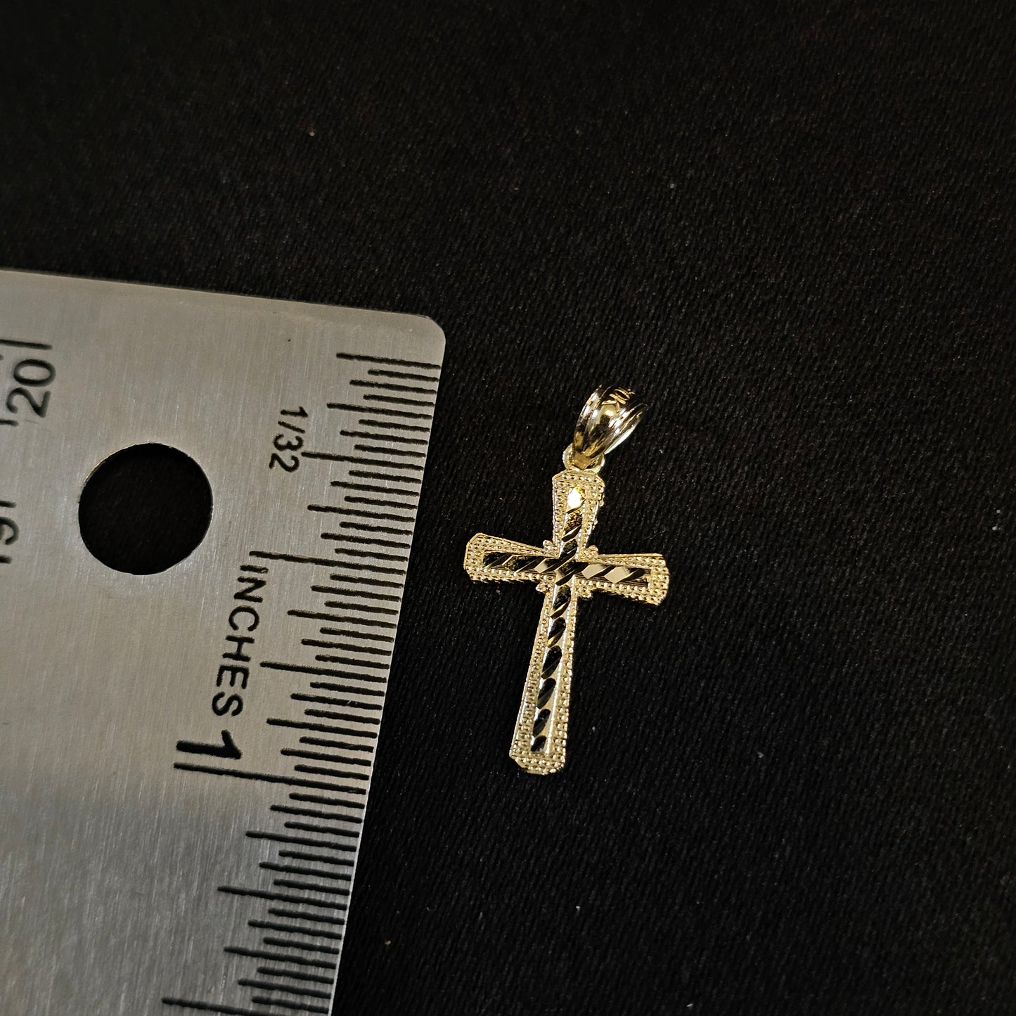 Cross w/ Diamond Cuts 10k